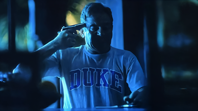 White Lotus dad with Duke shirt and gun template variation
